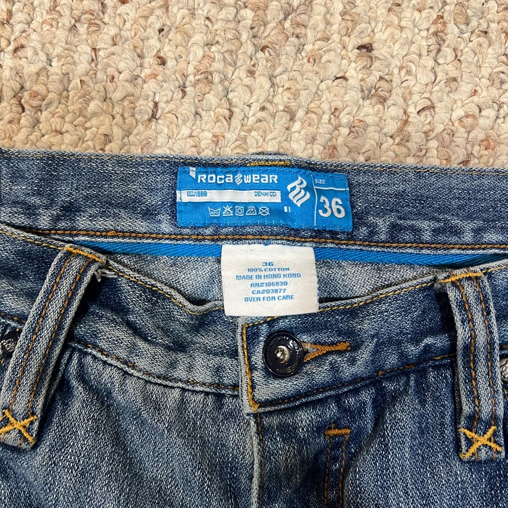 Rocawear Men's Denim Jeans with Blue Accents